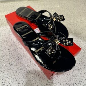 ELELISSA BLACK Flip Flop from EllE with gold rivets on Bow Very stylish sz 8